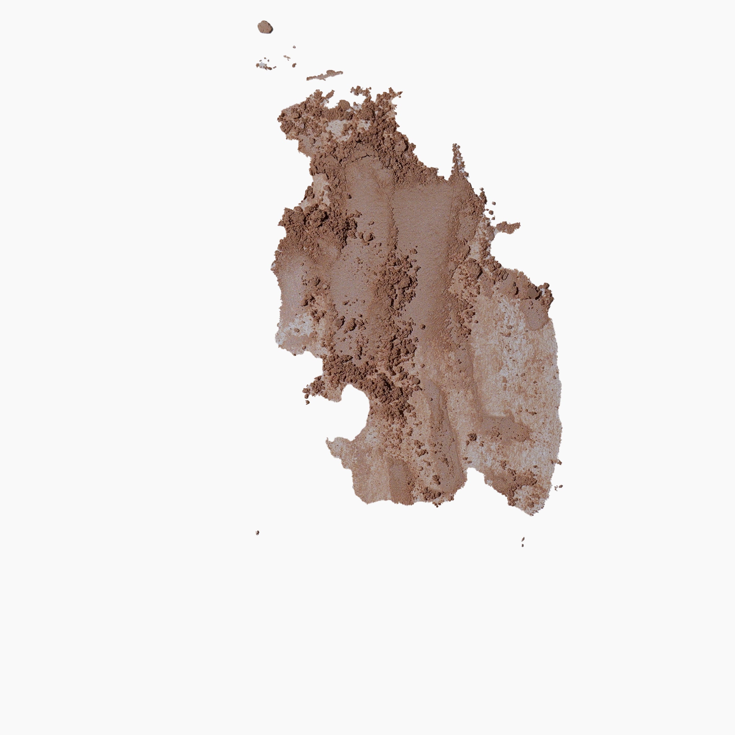 smeared texture of a tender compact powder minreal foundation on a surface