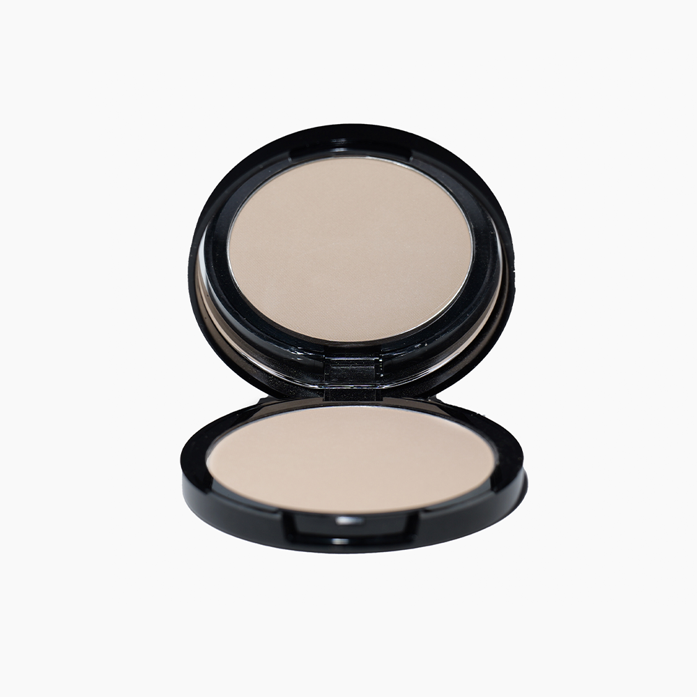 an open compact powder mineral foundation blonde color