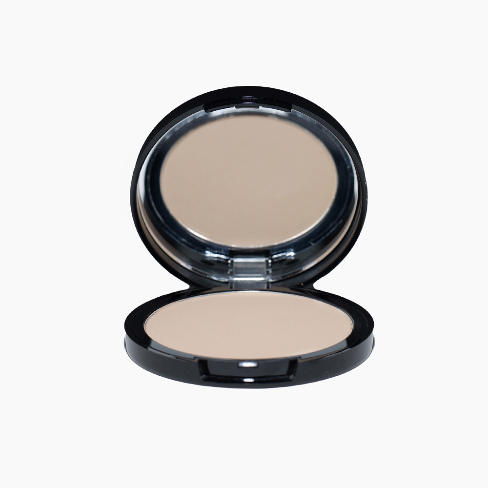 an open compact powder mineral foundation cream color