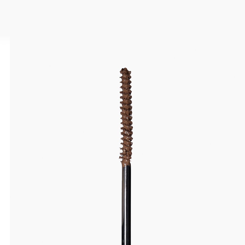 The brow ink brush shows the color brunette