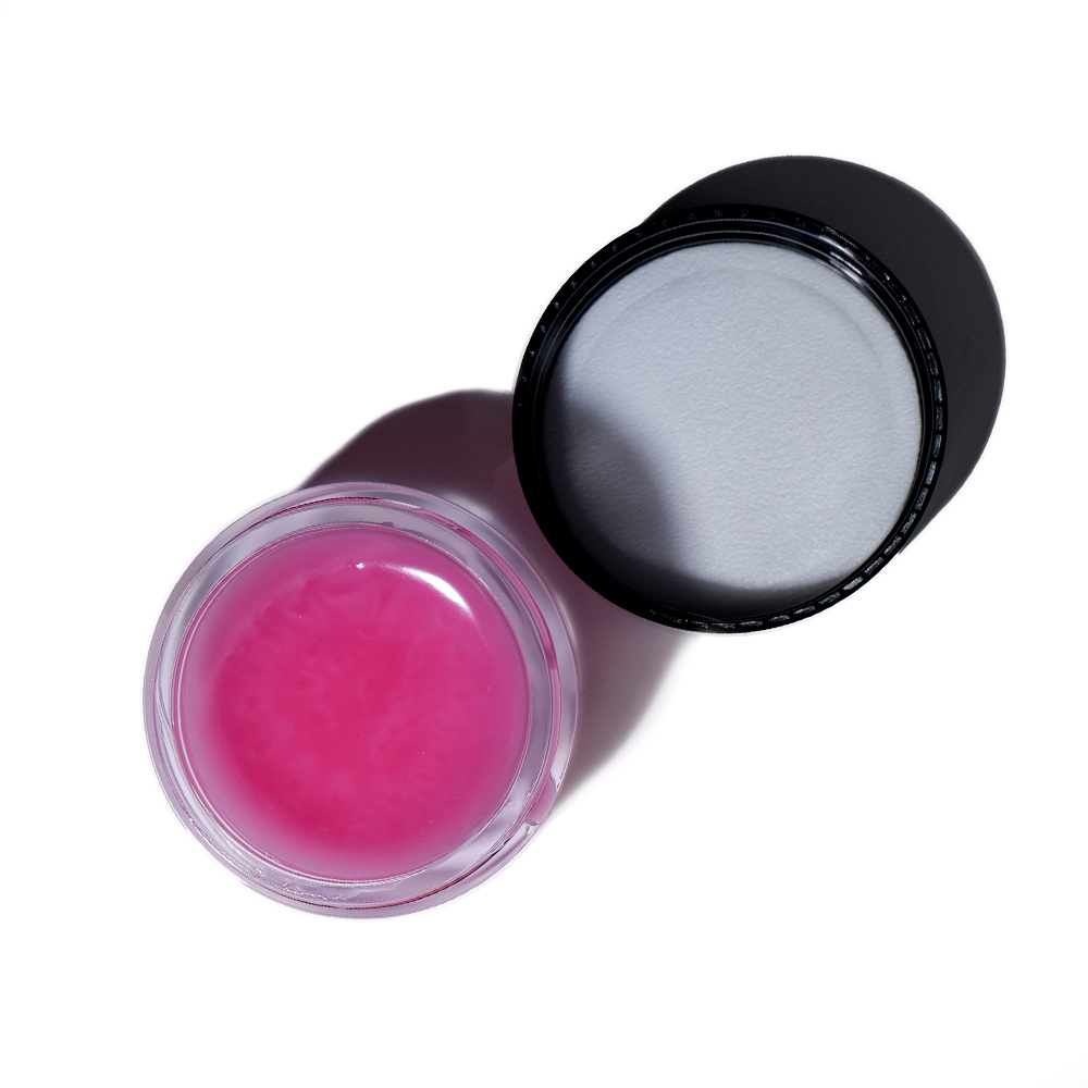 a rose lip balm from the brand Plá essentials seen from above